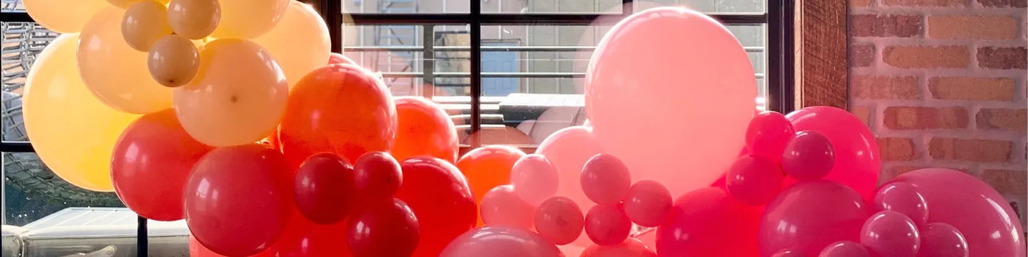 balloons in yellow red and pink