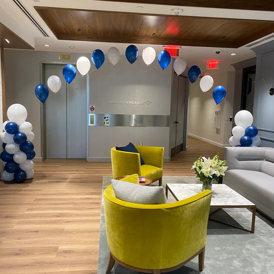 blue and white balloons inside bank of america lobby 